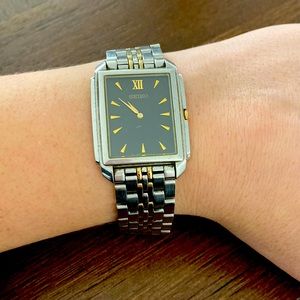 Black, gold and silver vintage seiko watch